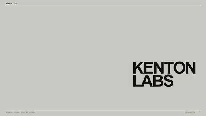 Kenton Labs lettering on a faint square drafting grid